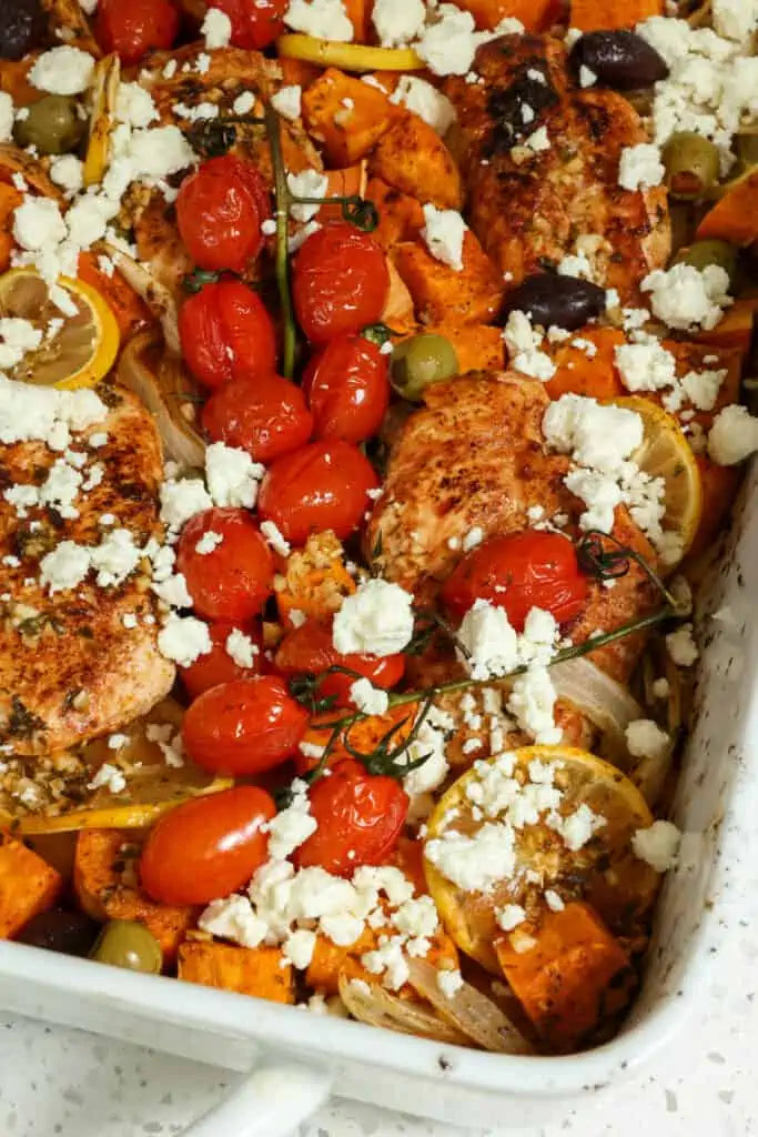Thyme chicken with sweet potato cubes, broccoli, and cherry tomatoes with feta