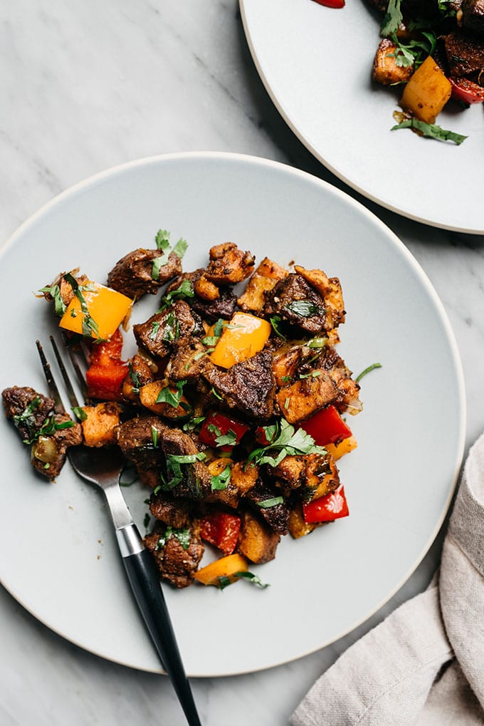Steak bites with sweet potatoes and mixed peppers