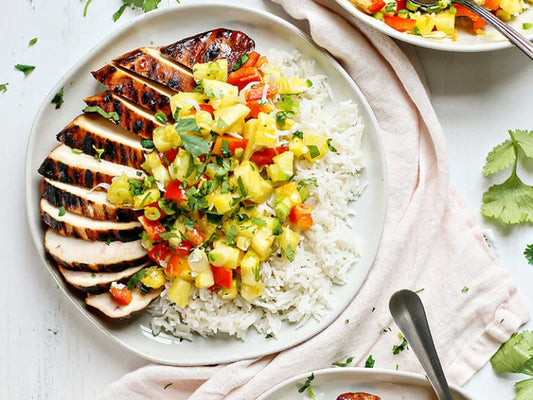 Lemon ginger chicken with a pineapple, mango, cucumber, feta salsa