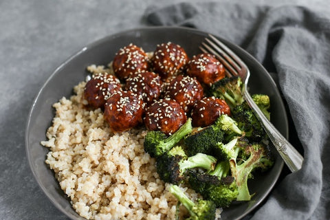 Chicken Cauliflower Meatballs Served over Vegetable Brown Rice