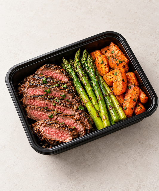 Butter garlic herb sirloin, asparagus, and roasted carrots